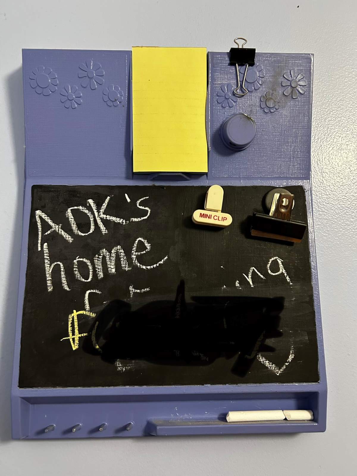 The obscene message was left on a chalkboard in the home’s kitchen.