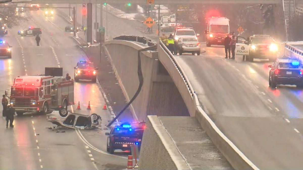 Two people were sent to hospital with serious injuries and Calgary police shut down Crowchild Trail NW in both directions after a vehicle tumbled off the overpass at 16 Avenue Monday morning.