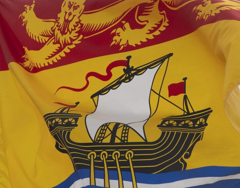 New Brunswick's provincial flag flies on a flagpole in Ottawa, Friday, July 3, 2020. THE CANADIAN PRESS/Adrian Wyld.