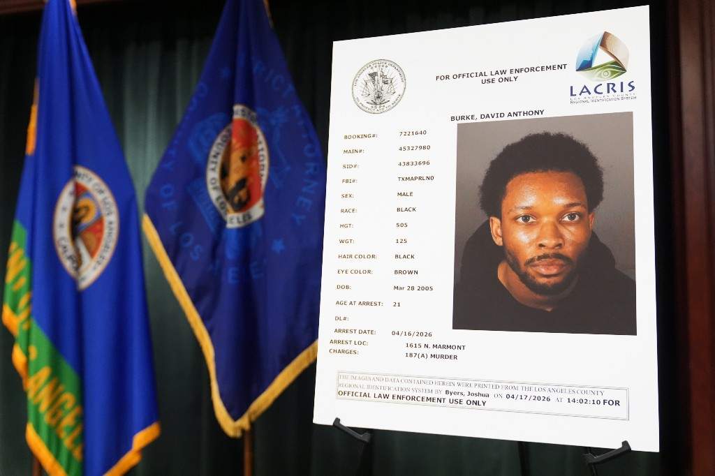 A mugshot of David Anthony Burke, whose stage name is D4vd, is displayed Monday, April 20, 2026, in Los Angeles at a press conference regarding the case of D4vd, who was arrested on suspicion of killing a 14-year-old girl whose dismembered body was found in his car.