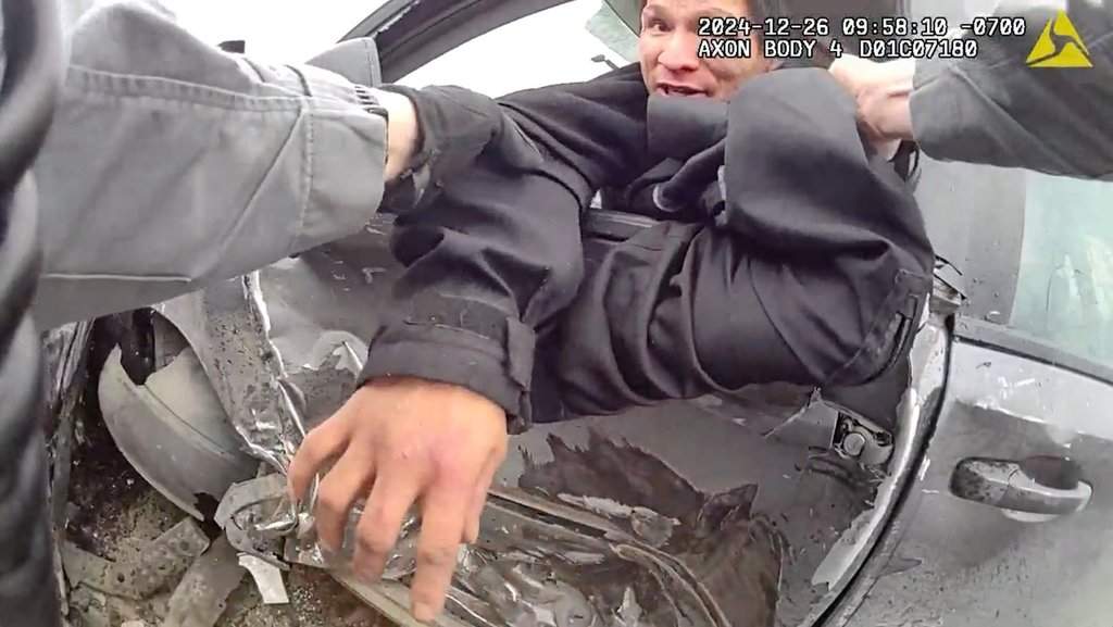 Duane Nepoose is shown in this still image from video during his arrest after he crashed a stolen van and caused the crash that left nine-year-old Victoria Desjardins dead in Calgary, on Dec. 26, 2024.