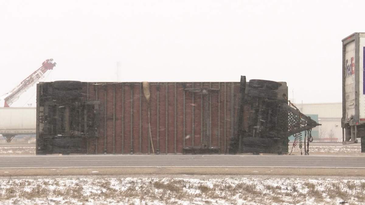 A flipped over semi in Edmonton where motorists endured a treacherous Friday morning commute.