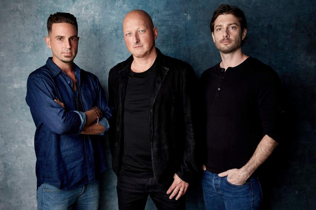James Safechuck, from right, director Dan Reed and Wade Robson pose for a portrait to promote the film 'Leaving Neverland' during the Sundance Film Festival on Jan. 24, 2019.