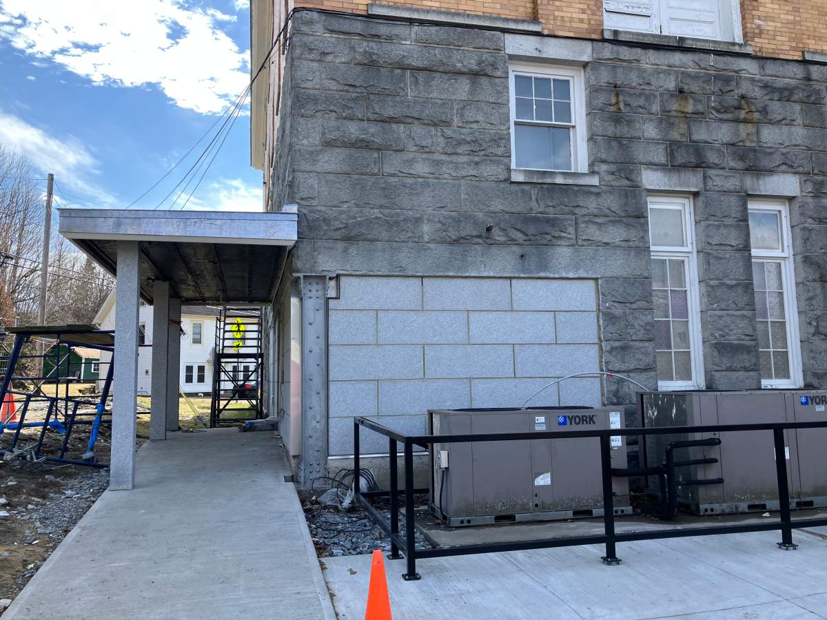 A historic Canada-U.S. border library is nearing completion of a new Canadian entrance after access changes restricted how Canadians enter the building.