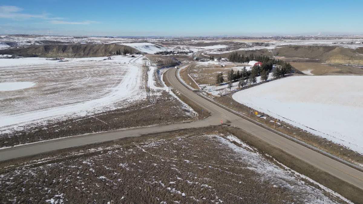 An aerial view of the intersection of Highway 552 and 128 Street, northeast of Okotoks, where Miller's body was found in a nearby field.