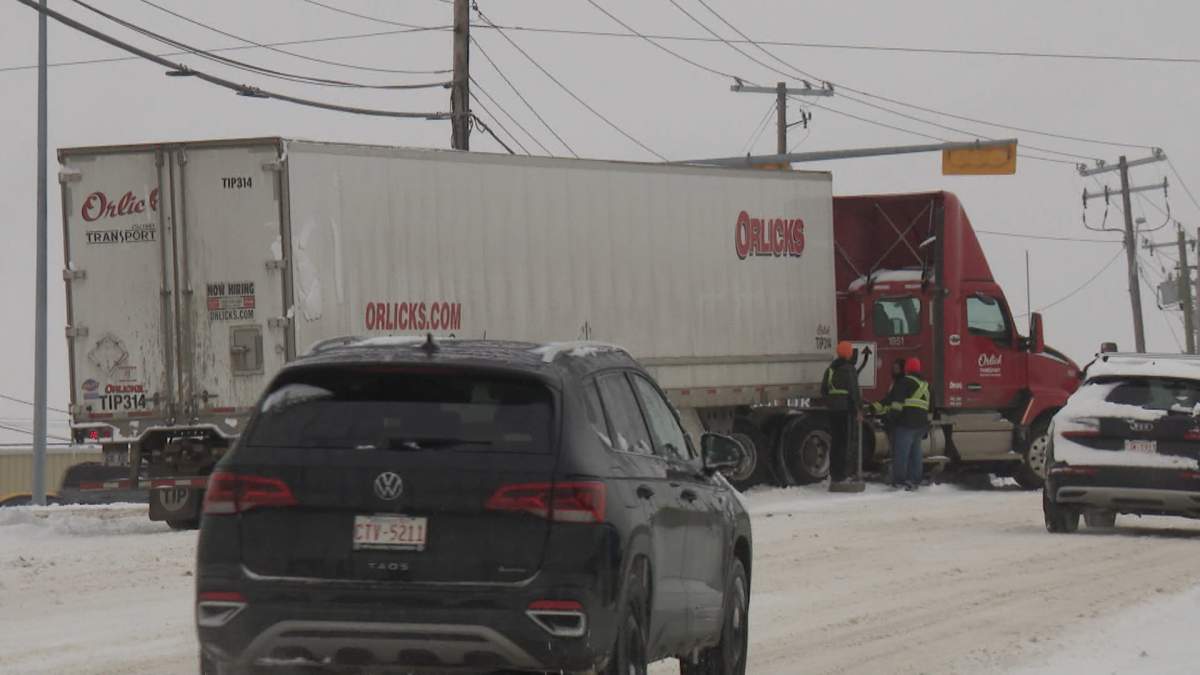 A jackknifed semi truck in northeast Calgary, one of many vehicles that had trouble navigating the city's snow streets Thursday morning.