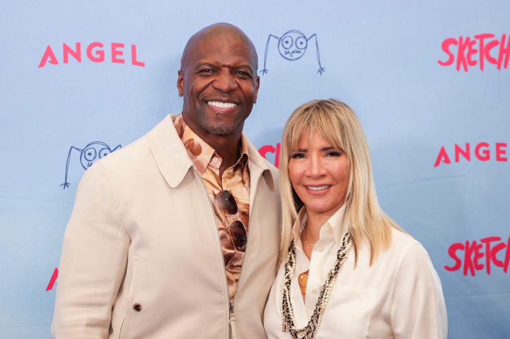 Terry Crews, left, and Rebecca King-Crews arrive at the premiere of 'Sketch' on Monday, July 28, 2025, at Cinemark Playa Vista in Los Angeles.