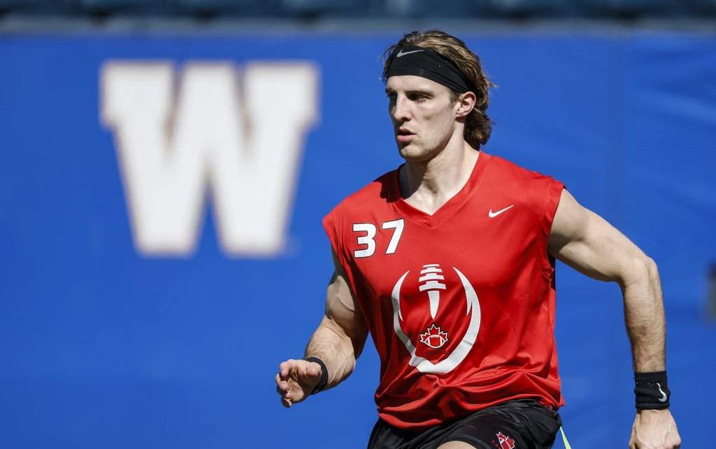 Team Canada Emile Chenevert (37) warms up during Canada flag football selection camp action in Winnipeg, Friday, May 1, 2026. THE CANADIAN PRESS/John Woods.