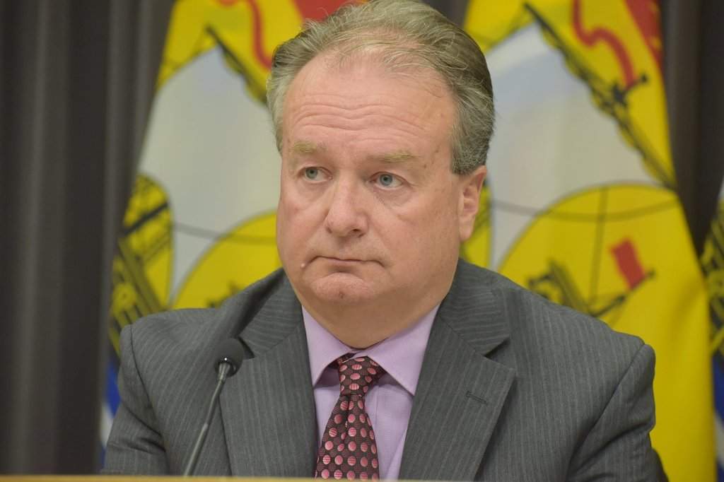 New Brunswick Local Government Minister Aaron Kennedy speaks to reporters during a news conference announcing property tax reforms in Fredericton on Wednesday May 27, 2026. THE CANADIAN PRESS/Eli Ridder.