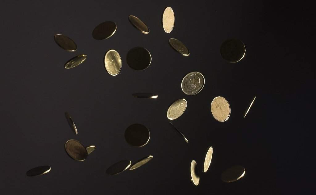 Canadian coins falling