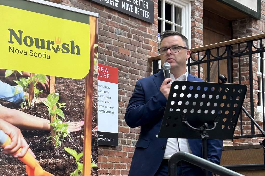 Nova Scotia Education Minister Brendan Maguire speaks at Nourish Nova Scotia's Nourish Fest event at the Halifax Brewery Market, in Halifax, on Sunday, Oct. 19, 2025. THE CANADIAN PRESS/Emily Baron Cadloff.