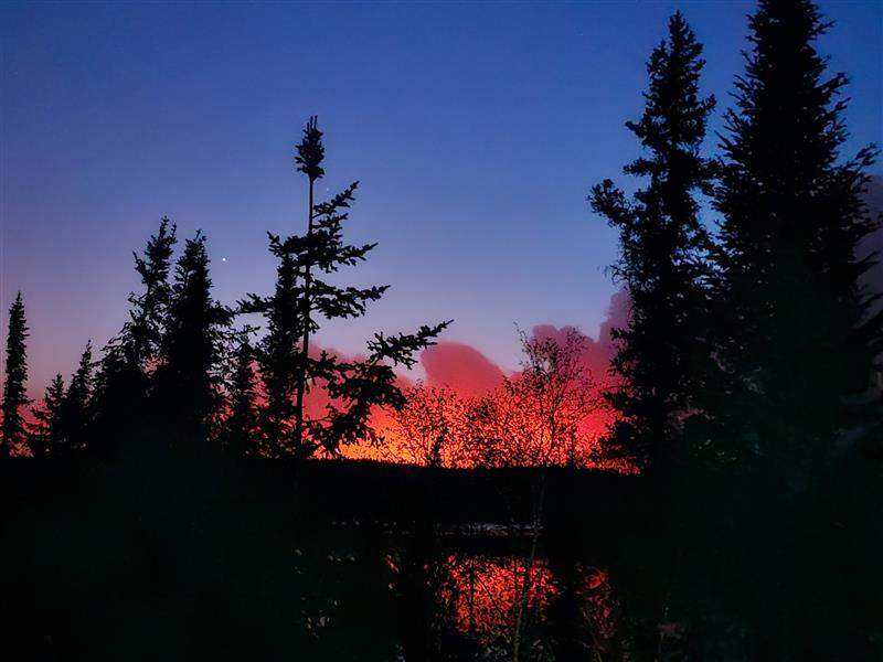 The wildfire across the lake from Pat and Russ Popp’s home last spring.
