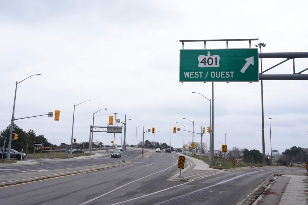 Ontario Provincial Police are investigating after reports of gunfire on Highway 401 in Mississauga left one person injured by shattered glass debris. 