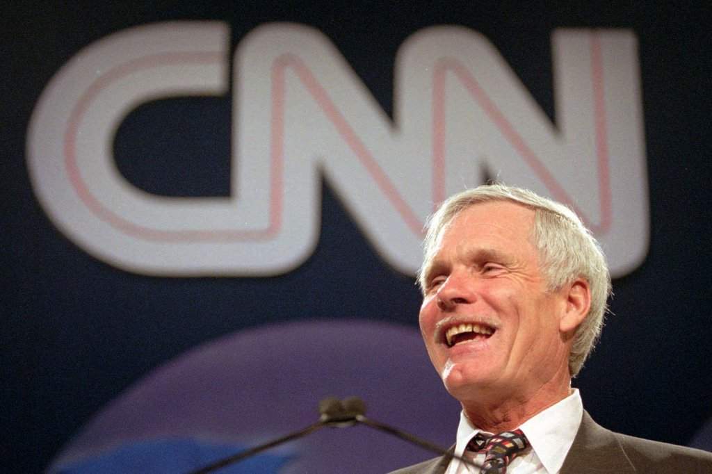 FILE - Ted Turner speaks during the CNN World Report Contributors banquet in Atlanta on May 4, 1995. (AP Photo/John Bazemore, File).