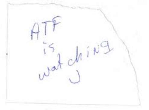 An image from U.S. prosecutors of a note reading ‘ATF is watching U’ allegedly left by a defendant for targets of a federal firearms trafficking investigation announced by the U.S. attorney for the District of New Hampshire on May 14, 2026.