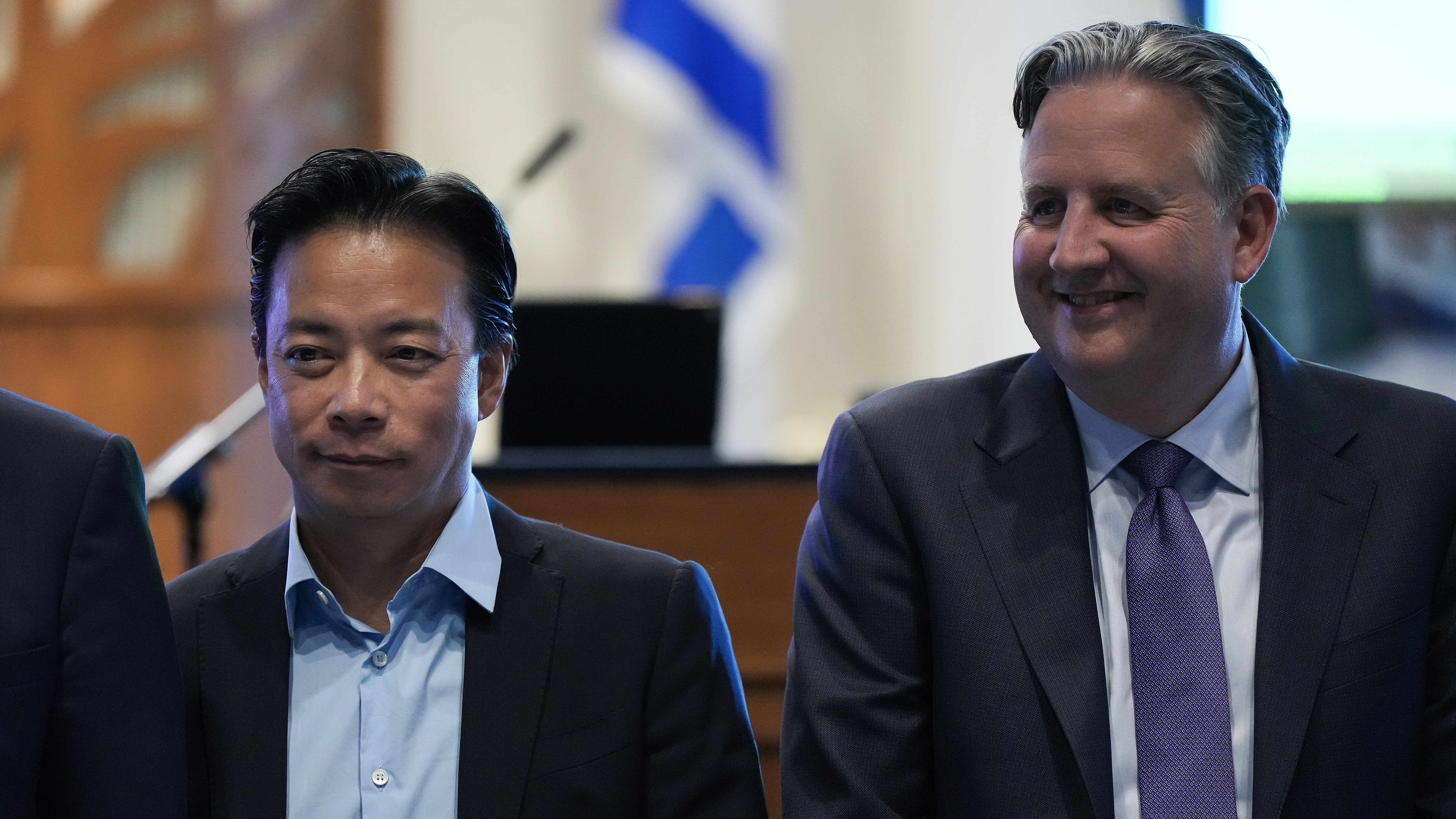 Vancouver mayoral candidates Ken Sim, left, and Kennedy Stewart at town hall, September 7, 2022. THE CANADIAN PRESS/Darryl Dyck