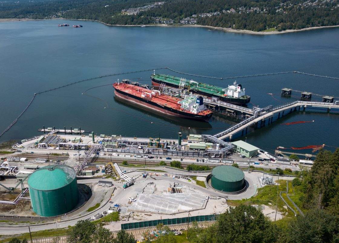 Crude oil tankers SFL Sabine, front left, and Tarbet Spirit are seen docked at the Trans Mountain Westridge Marine Terminal, where crude oil from the expanded Trans Mountain Pipeline is loaded onto tankers, in Burnaby, B.C., on Monday, June 10, 2024. THE CANADIAN PRESS/Darryl Dyck.