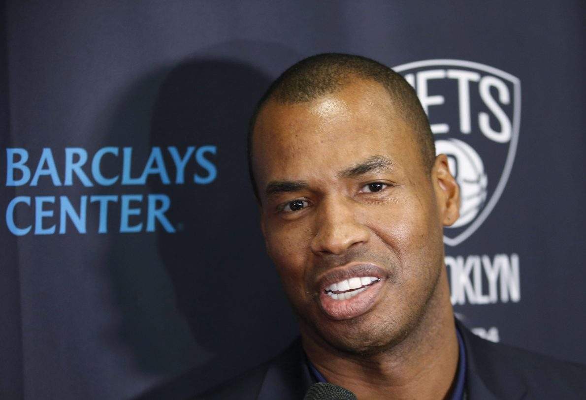 Jason Collins, a 13-year NBA veteran and the NBA's only openly gay player, announces his retirement at a news conference before a basketball game between the Milwaukee Bucks and the Brooklyn Nets on Wednesday, Nov. 19, 2014, in New York. Collins joined the Nets in February and played 22 games for the team, but was not on the roster this season. (AP Photo/Kathy Willens).
