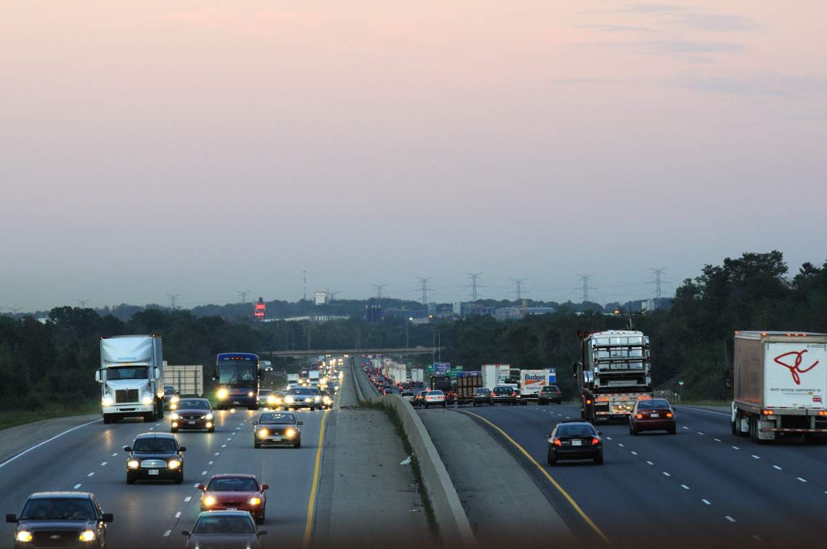 Highway 401 in southwestern Ontario with vehicle traffic.
