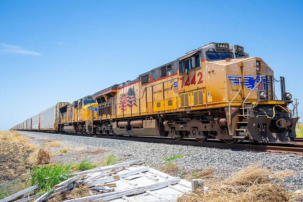 A Union Pacific freight train travels on July 29, 2025 in Hutto, Texas. Union Pacific has reached an agreement to purchase Norfolk Southern in a $85 billion deal. The acquisition forms the United States' first coast-to-coast rail network, spanning over 50,000 miles from East to West.