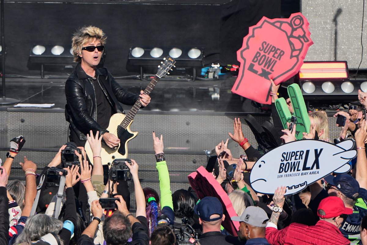 Billie Joe Armstrong of Green Day performs before the NFL Super Bowl LX game between the Seattle Seahawks and New England Patriots on Feb. 8, 2026, in Santa Clara, Calif. (AP Photo/Charlie Riedel).