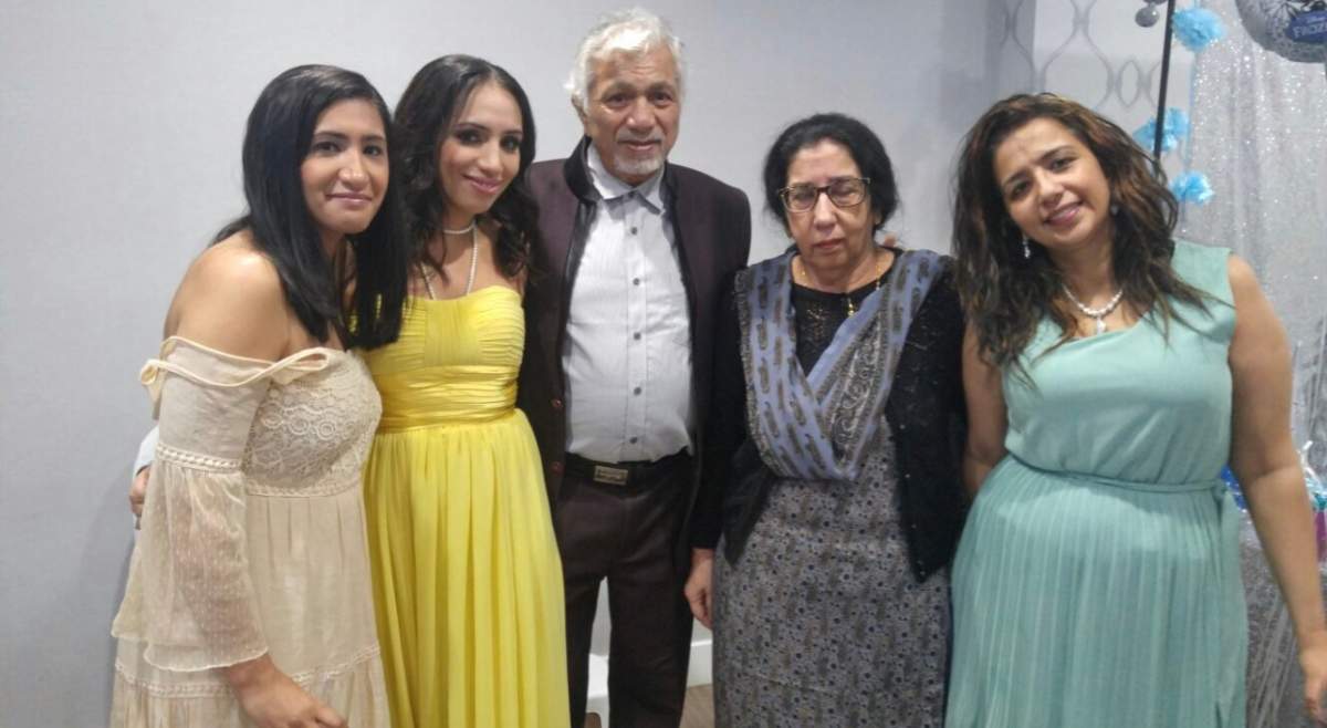 New Asian Village restaurant founder Harmeet Kapur with his wife and three daughters, who now run the three locations in the Edmonton area.