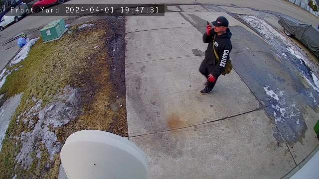 Court evidence video still of Wesley Grist on the phone after finding his son dead inside his landlord’s home in south Edmonton’s Summerside neighbourhood in April 2024.