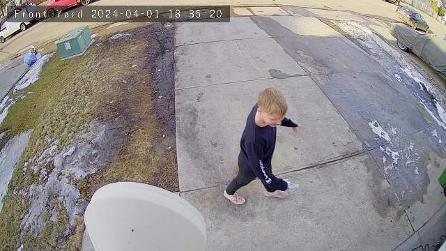 Court evidence video still of Kache Grist playing on the driveway shortly before being killed by two dogs in his father’s landlord’s home in south Edmonton’s Summerside neighbourhood in April 2024.