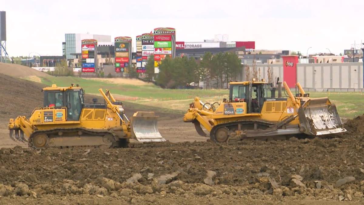 Construction equipment preparing the ground near where the Terwillegar Drive overpass is being expanded at Anthony Henday Drive, as seen on Friday, May 22, 2026.