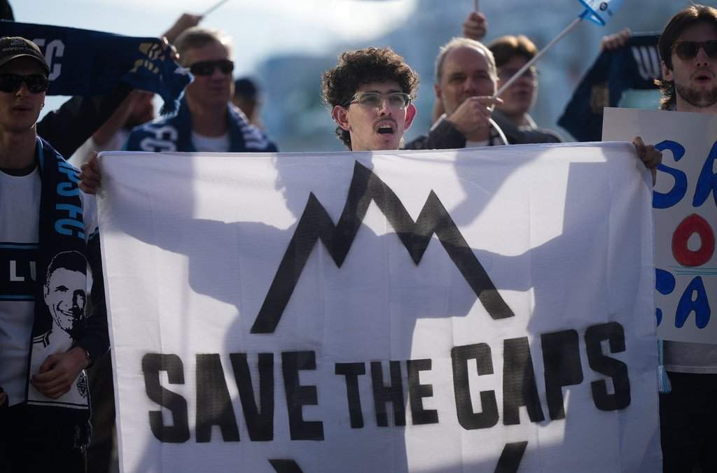Fans of the Vancouver Whitecaps MLS soccer team rally to keep the team in Vancouver, outside the 76th FIFA Congress in Vancouver on Thursday, April 30, 2026. THE CANADIAN PRESS/Darryl Dyck