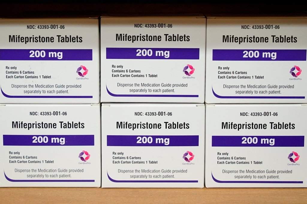 FILE - Boxes of the drug mifepristone sit on a shelf at the West Alabama Women's Center in Tuscaloosa, Ala., March 16, 2022. (AP Photo/Allen G. Breed, File).