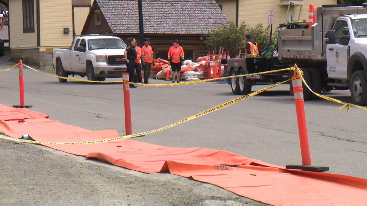 The town of Banff is preparing for the possibility of flooding by setting up temporary flood barriers called a "Tiger Dam."