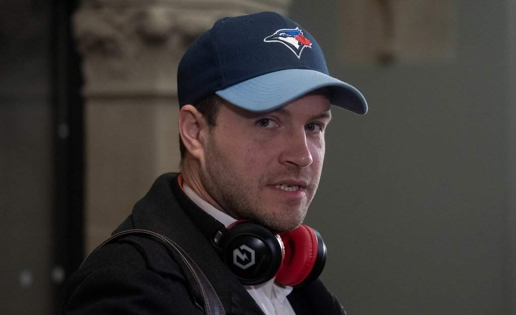 Liberal MP for Beaches-East York Nate Erskine-Smith speaks with reporters as he makes his way to caucus on Parliament Hill in Ottawa, Wednesday, Nov. 26, 2025. 