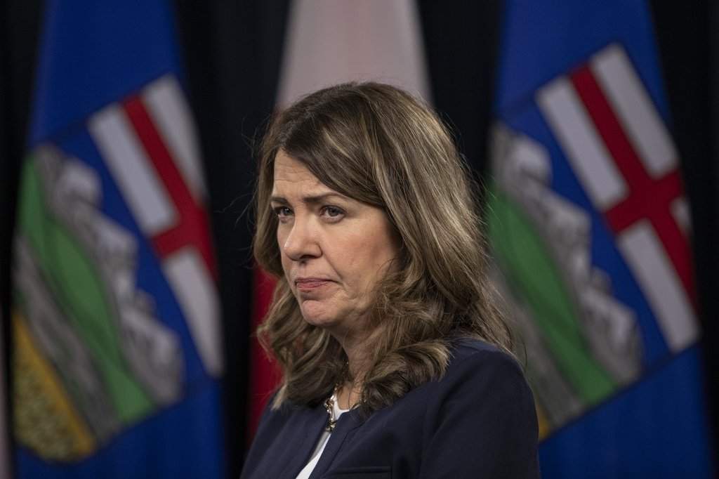 Premier Danielle Smith speaks to the media at the Legislature in Edmonton, on Wednesday, December 10, 2025.