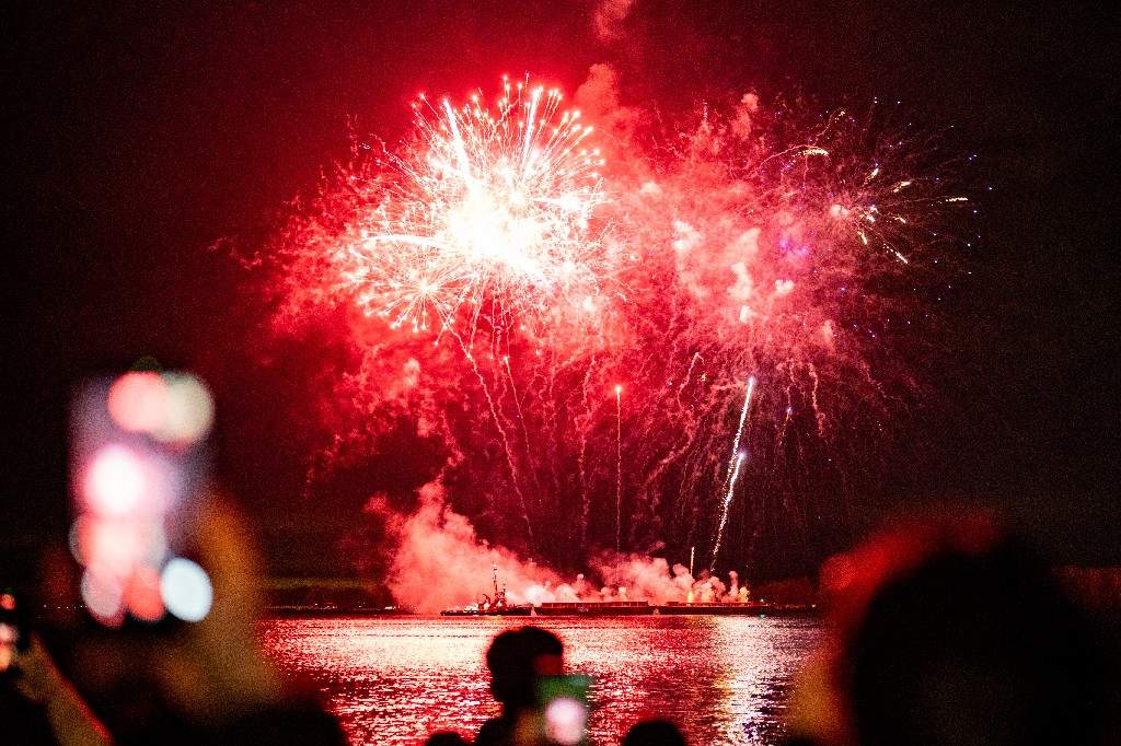 Fans of Drake gather to watch a fireworks show believed to be promoting his upcoming album 'ICEMAN' in Toronto on Friday, May 14, 2026.