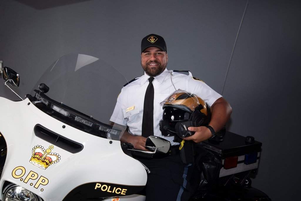 Sgt. Brandon Malcolm is shown in this handout image provided by Ontario Provincial Police. Malcolm was a respected police officer whose life was ‘taken far too soon’ while on duty in a highway crash east of Toronto, said Ontario Provincial Police commissioner Thomas Carrique on Monday.