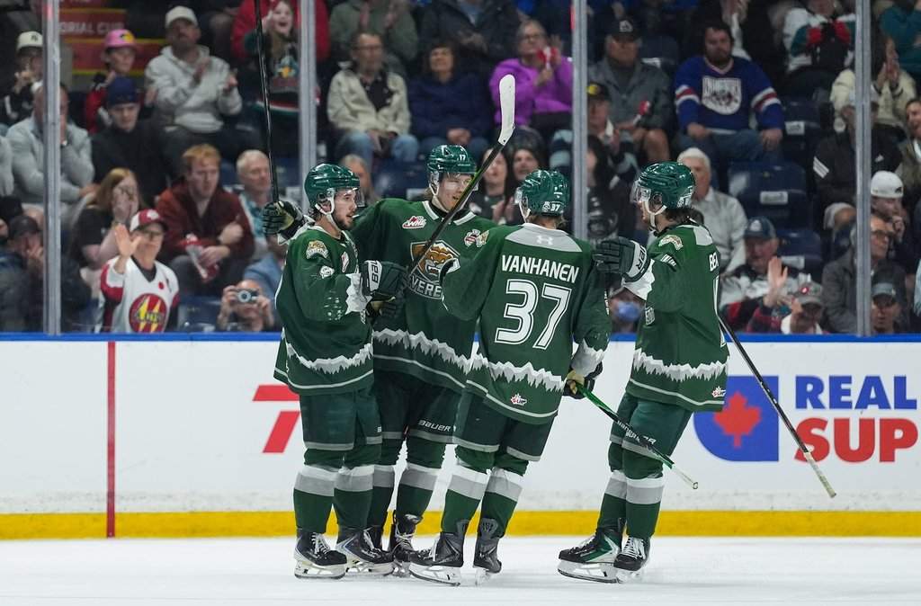 Everett Silvertips' Landon DuPont, from left to right, Julius Miettinen, Matias Vanhanen and Carter Bear celebrate DuPont's second goal during the second period of the Memorial Cup semifinal hockey game against the Chicoutimi Sagueneens, in Kelowna, B.C., on Friday, May 29, 2026. THE CANADIAN PRESS/Darryl Dyck.