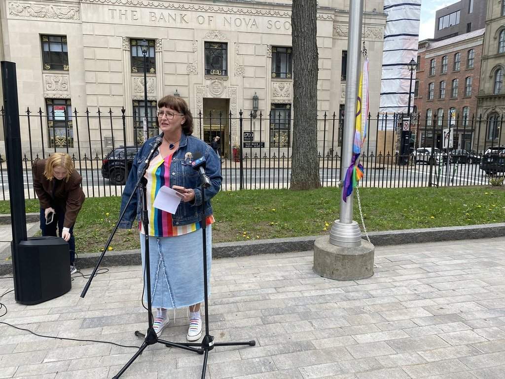 NDP member Lisa Lachance hosts a pride flag raising outside of the Nova Scotia legislature on May 19, 2026 THE CANADIAN PRESS/Lyndsay Armstrong.