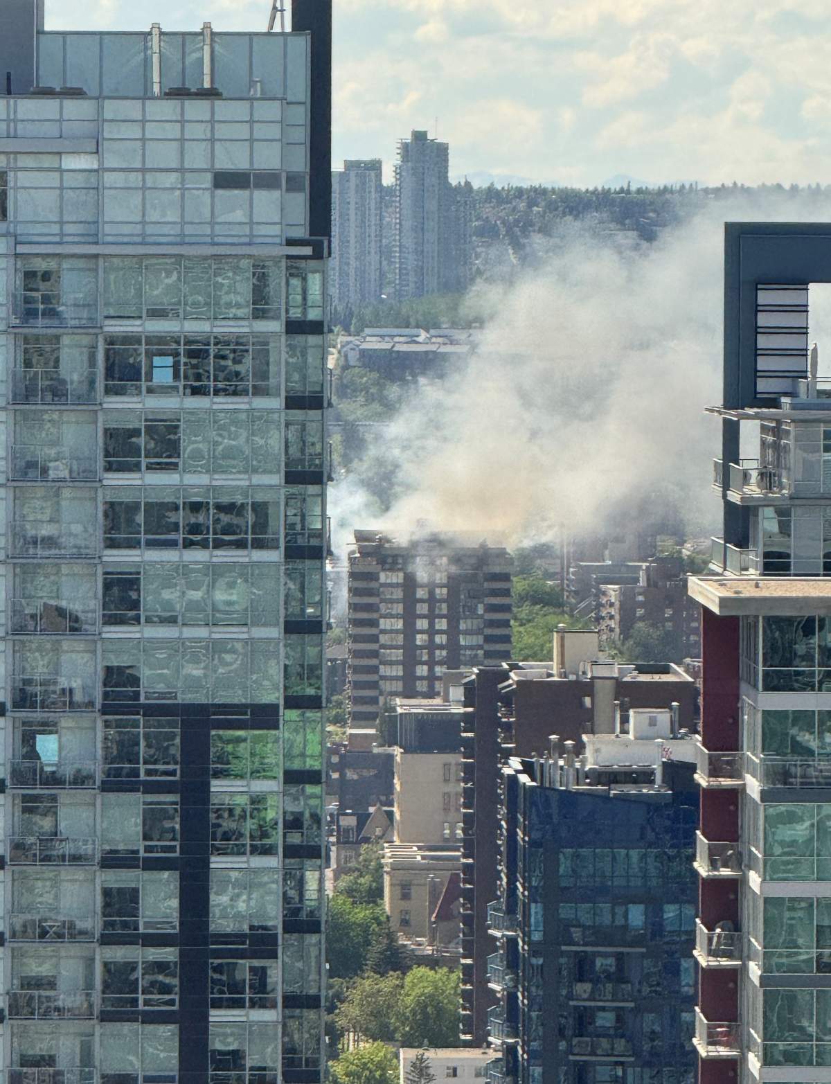 A column of thick smoke could be seen rising over downtown Calgary after a fire broke out in a downtown high rise Friday afternoon.
