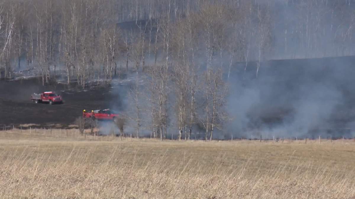 At the time the fire in the Cochrane townhouse complex broke out, a large amount of the town's firefighting resources were already on scene of a large brush fire west of town.
