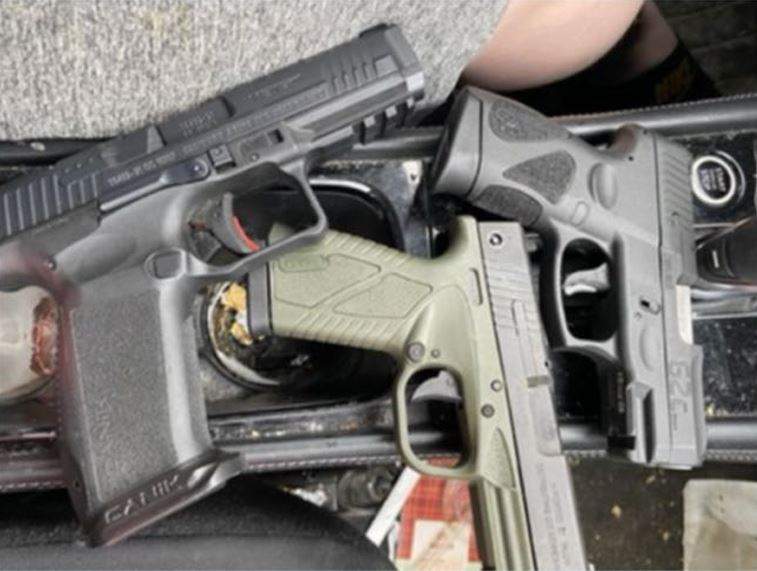 This photo is included as evidence in a federal grand jury indictment alleging a firearm trafficking network that smuggled guns from New Hampshire into Canada, as revealed by the U.S. Attorney's Office for the District of New Hampshire on May 14, 2026.