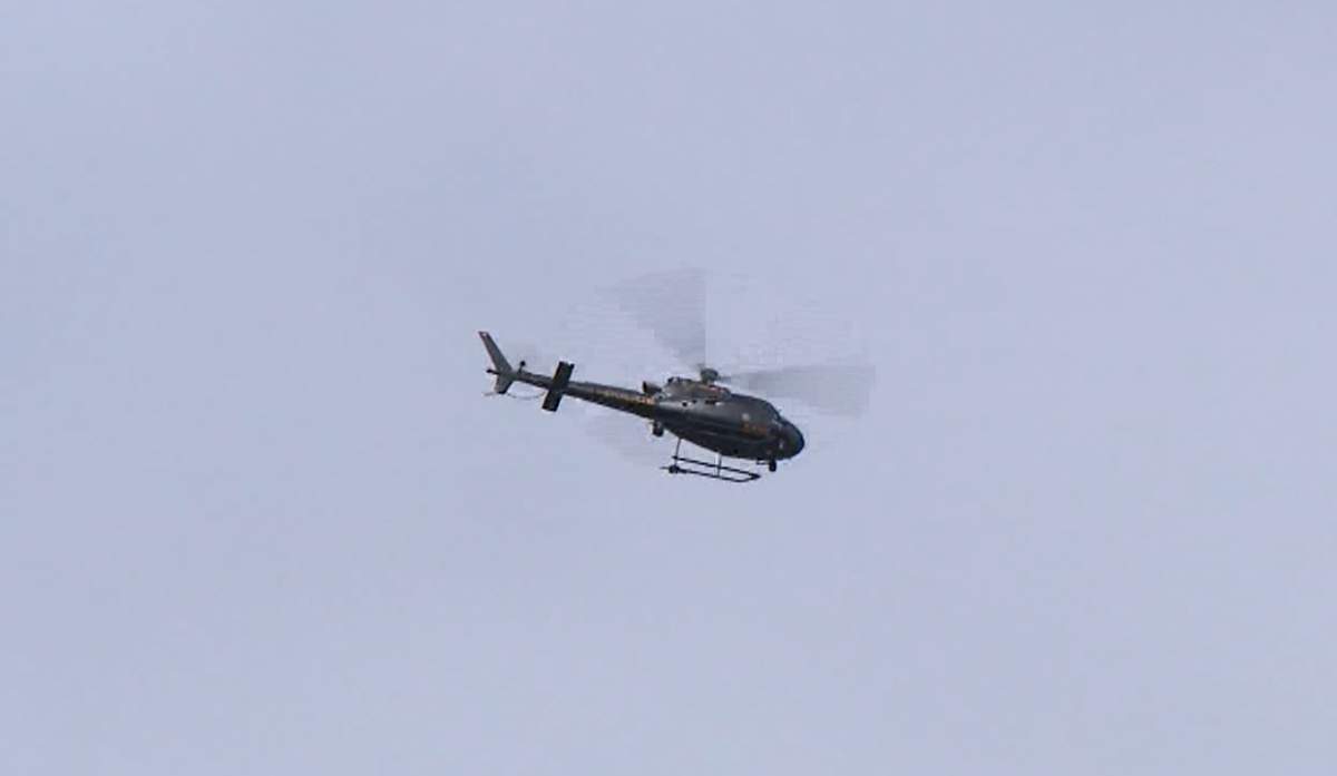 Heavily armed members of the Calgary police tactical team, along with the HAWCS helicopter descended on the northeast neighbourhood of Thorncliffe Monday morning after officers received a call about a man with a weapon.