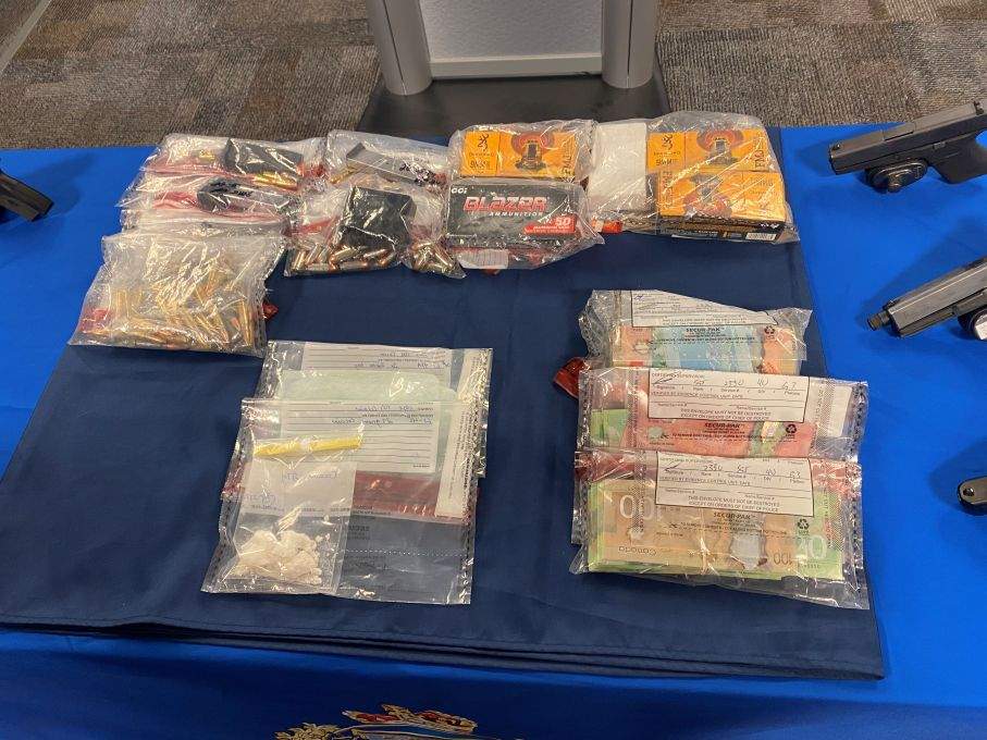 Items seized by police, along with the firearms and ammunition, included cash and cocaine, the WPS said.