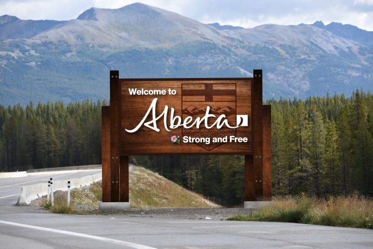 The government of Alberta says new "Welcome to Alberta" signs will be ditching the long-standing "Wild Rose Country" slogan in favour of "Strong and Free," the same new slogan that will adorn Alberta licence plates.