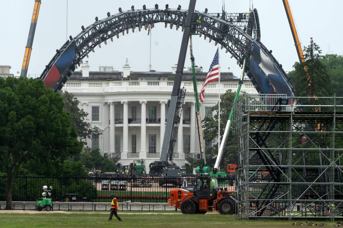Equipment is seen being placed on the South Lawn of the White House, Tuesday, May 26, 2026, in Washington for a future UFC mixed martial arts fight to be held on June 14 as part of America 250 celebrations.