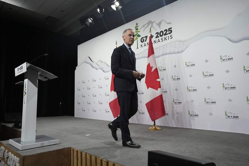 Prime Minister Mark Carney leaves the podium following the closing news conference at the G7 Summit in Kananaskis, Alta., Tuesday, June 17, 2025.