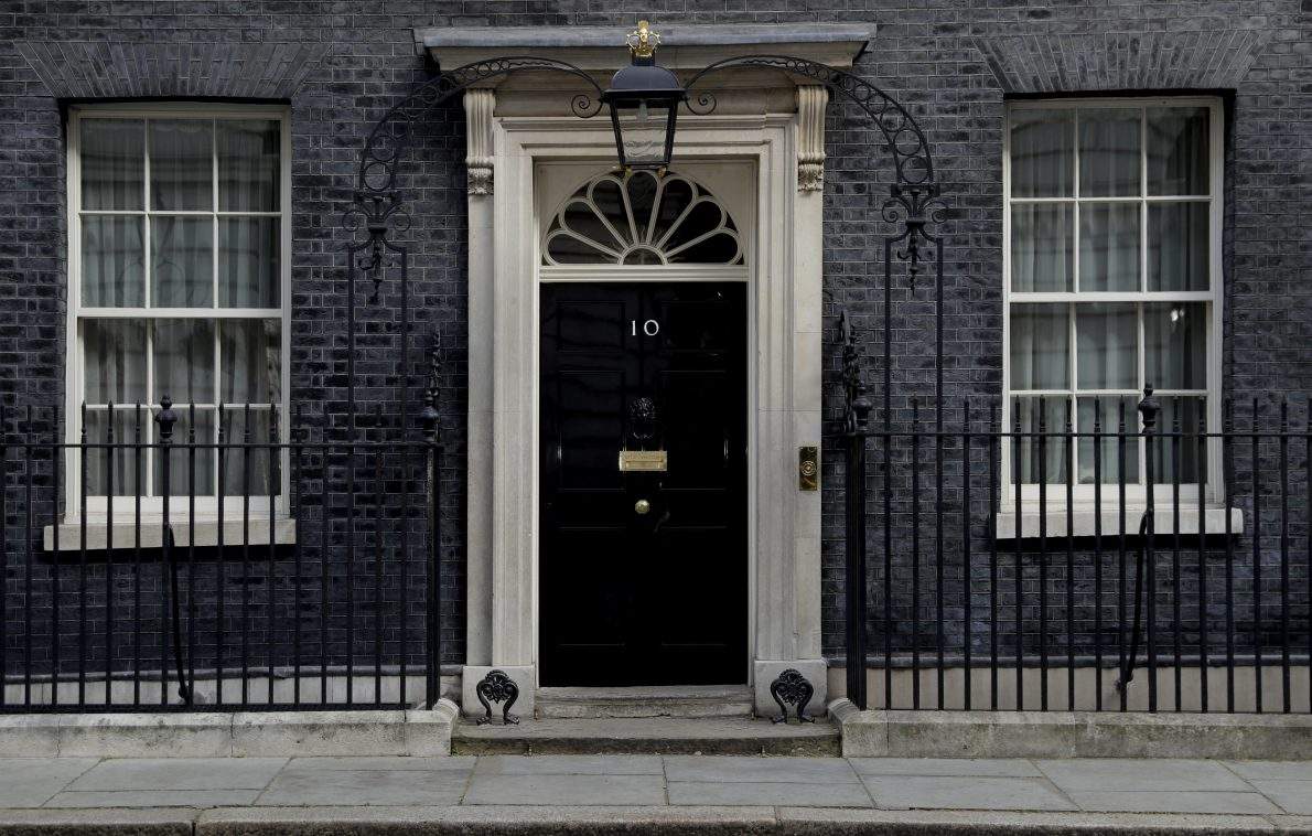 FILE – View at the closed door of 10 Downing Street in London, April 7, 2020.
