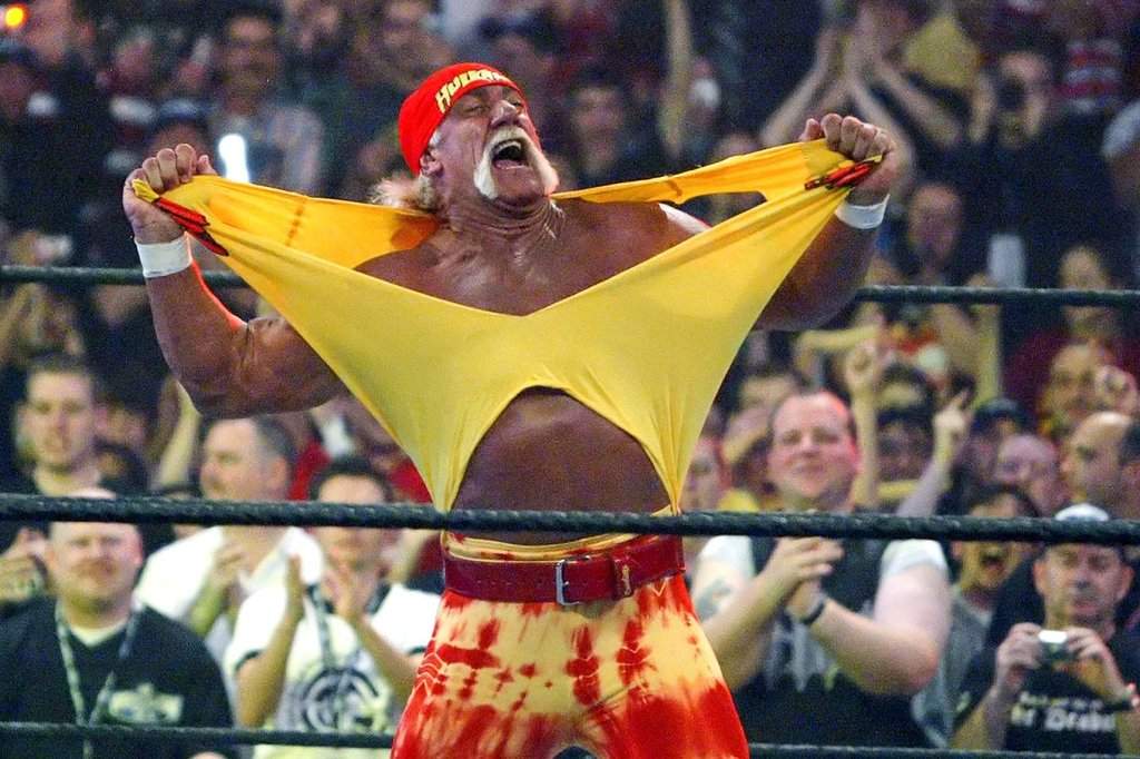 FILE - Famed wrestler Hulk Hogan fires up the crowd between matches during WrestleMania 21 in Los Angeles, April 3, 2005.