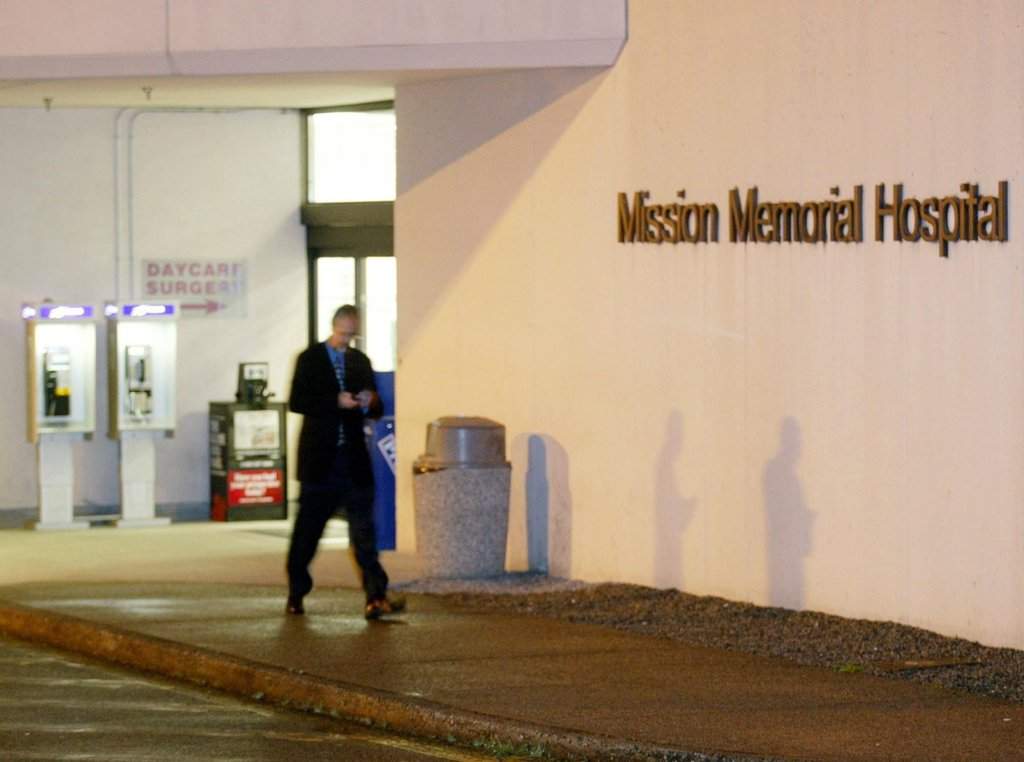 A man walks past the front doors of Mission Memorial Hospital in Mission, BC, Tuesday, May 20, 2003. 