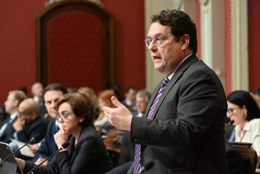 Bernard Drainville, Quebec's minister of economy, innovation and energy, responds to the opposition during question period at the national assembly, Tuesday, May 26, 2026. 